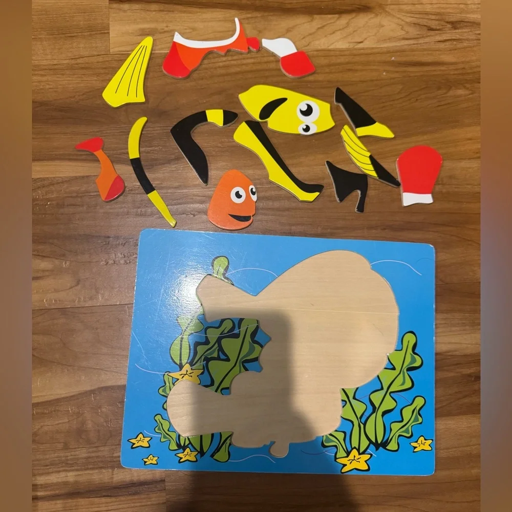 Wooden jigsaw puzzle. No missing pieces.